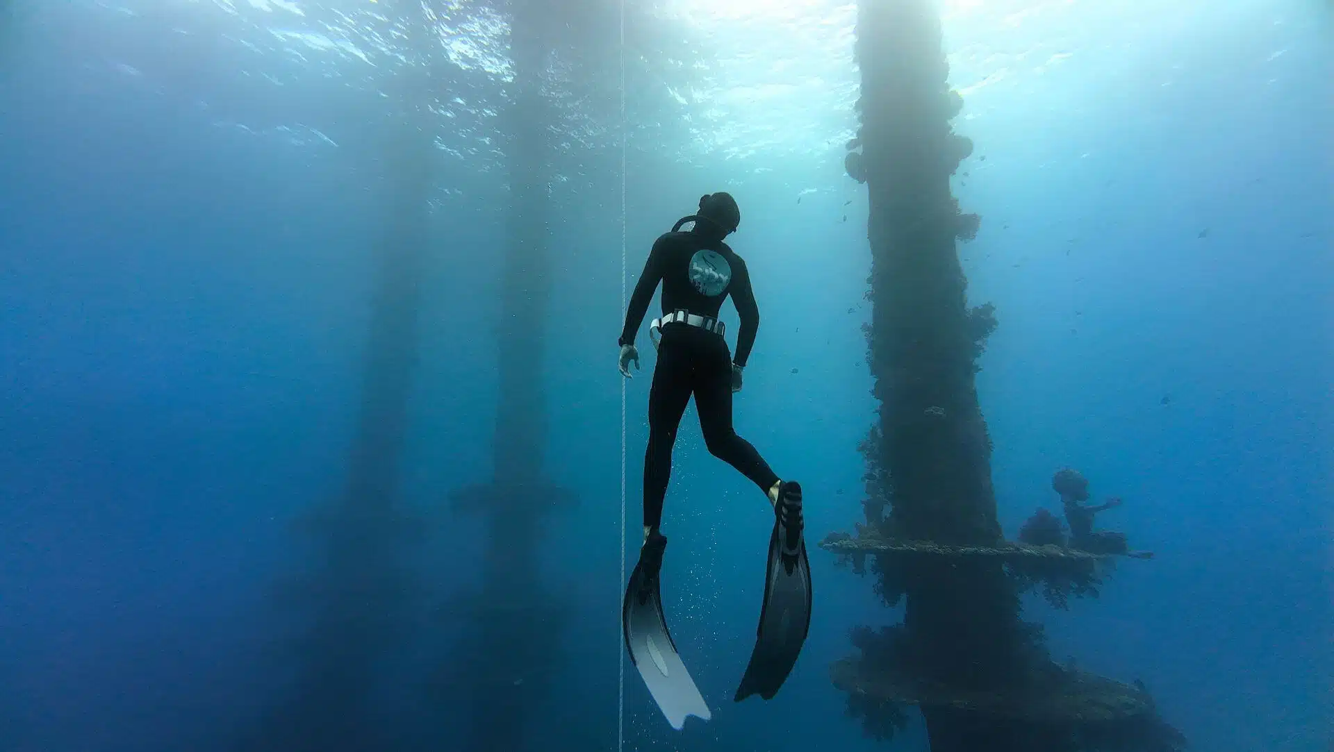 Deep freediving in the clear water of Eilat